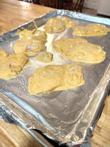 Adding chicken to pan